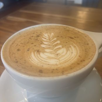 Terrain Coffee Project - Looking pretty. Regular latte with some cinnamon. - Coffee & Tea Near Me - Vancouver, Washington