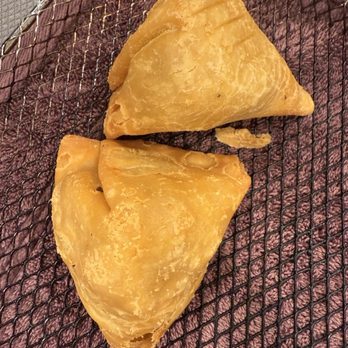 More Curry! - Samosa's. Delicious, I wish they were more spicy. So I'm biased. - Indian Near Me - Corona, California