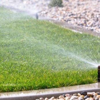 YM Landscape - a sprinkler spraying water on a lawn - Landscaping Near Me - Winston-Salem, North Carolina YM Landscape - a sprinkler spraying water on a lawn - Landscaping Near Me - Winston-Salem, North Carolina
