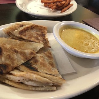 Sala Thai - Roti with curry dip. It's not "roti" actually but a "paratha" which you can get 25 pack for $7 from any Indian/Pakistani store. - Thai Near Me - Richmond, California Sala Thai - Roti with curry dip. It's not "roti" actually but a "paratha" which you can get 25 pack for $7 from any Indian/Pakistani store. - Thai Near Me - Richmond, California