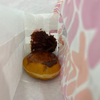 Dunkin' - How is it possible to enjoy a Boston cream donut when I can't even put it in the bag correctly - Coffee & Tea Near Me - Toms River, New Jersey