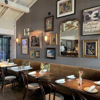 Violet Bistro - a dining area with tables and chairs - French Near Me - Los Angeles, California Violet Bistro - a dining area with tables and chairs - French Near Me - Los Angeles, California