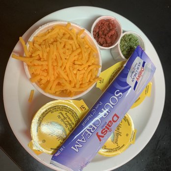 Mary's Cafe - $2 condiments. Fake better, fake bacon bits, fake chives..., - American Near Me - Strawn, Texas