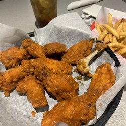 Coaches Bar & Grill - Garlic wing, fries and a tasty beverage.