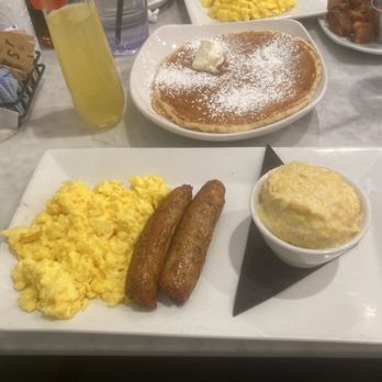 Easy Like Sunday - Pancake, scrambled eggs, chicken sausage and cheesy grits - Breakfast & Brunch Near Me - Baltimore, Maryland