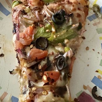 Curry Pizza House Folsom - A slice of premium veggie with pepper flakes added - Pizza Near Me - Folsom, California Curry Pizza House Folsom - A slice of premium veggie with pepper flakes added - Pizza Near Me - Folsom, California