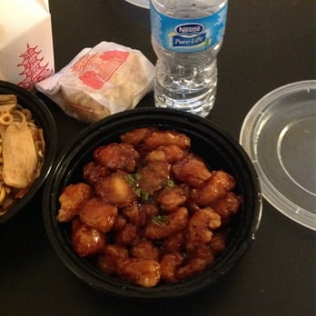 First Hong Kong Cafe - General Tso's chicken to-go. Water bottle for size comparison. - Chinese Near Me - Miami, Florida