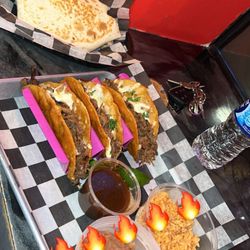 Muncheez Troy - Place is a GEM!! crunch wrap, 3 Birria and street corn. You can tell this place is run by family. So you're getting authentic Mexican food.