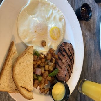 The Kitchen - Kitchen classic - over easy eggs, chicken sausage, potatoes and gluten free toast - Burgers Near Me - The Woodlands, Texas The Kitchen - Kitchen classic - over easy eggs, chicken sausage, potatoes and gluten free toast - Burgers Near Me - The Woodlands, Texas