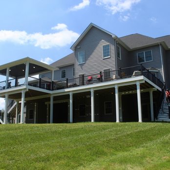 Atlantis Design And Build - a large house with a deck - General Contractors Near Me - Gaithersburg, Maryland Atlantis Design And Build - a large house with a deck - General Contractors Near Me - Gaithersburg, Maryland