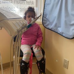 Marda Loop Family Dentistry - Sitting with Auntie at the dentist while I get a cleaning. The staff were so sweet and spoiled her!