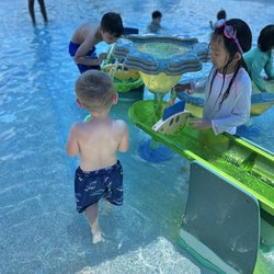 Rosemeade Rainforest Aquatic Complex - Water table in one of the splash pad areas for smaller kids