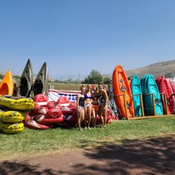Family Fun Tubing - Our New Tube Trackers 
(Red, left of the young ladies)