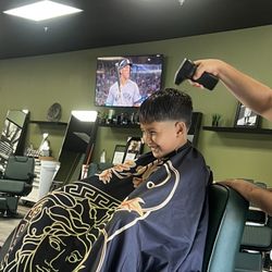 TRU Barbershop - My son being a cool kid at the barbershop