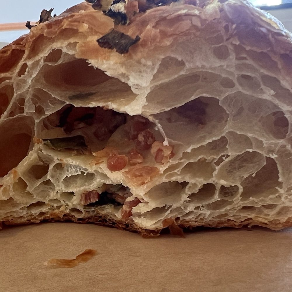Flat White Coffee - It's bacon bits not bacon pieces, inside the croissant. - Cafes Near Me - Cypress, California Flat White Coffee - It's bacon bits not bacon pieces, inside the croissant. - Cafes Near Me - Cypress, California