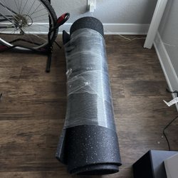 Rubber Flooring & Gym Mats - Rolled up rubber exercise mat