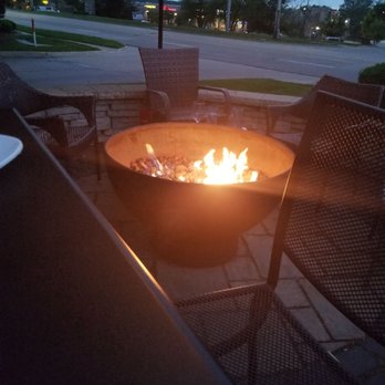 Barrel House - a fire pit on a patio - Bars Near Me - Davenport, Iowa
