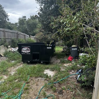 AV Dumpsters - Customer ordered container to clean up back yard - Dumpster Rental Near Me