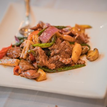 Wild Ginger - a plate of food with meat and vegetables - Asian Fusion Near Me - Great Neck, New York Wild Ginger - a plate of food with meat and vegetables - Asian Fusion Near Me - Great Neck, New York
