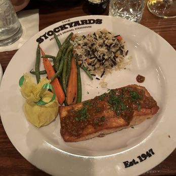 Stockyards Restaurant - Skillet Salmon, Rice Pilaf, and Seasonal Vegetable - Steakhouses Near Me - Phoenix, Arizona Stockyards Restaurant - Skillet Salmon, Rice Pilaf, and Seasonal Vegetable - Steakhouses Near Me - Phoenix, Arizona