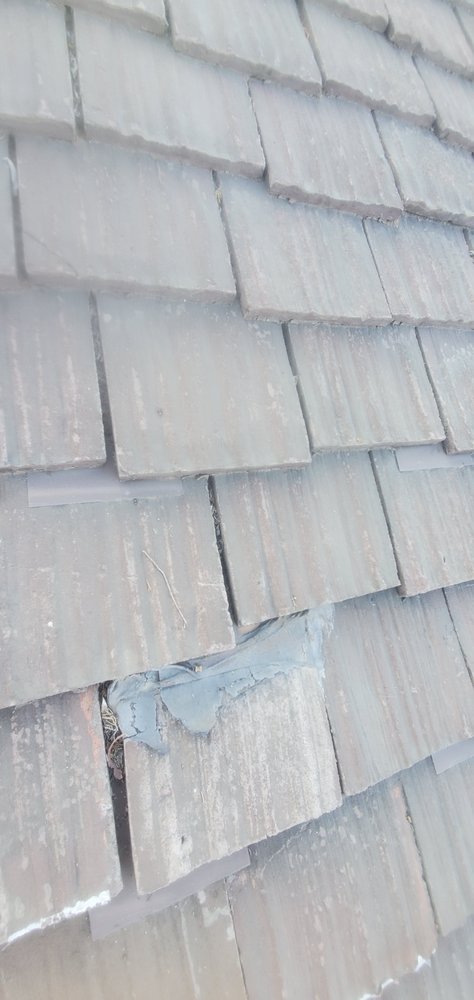 Slide of Quality Roofing Company