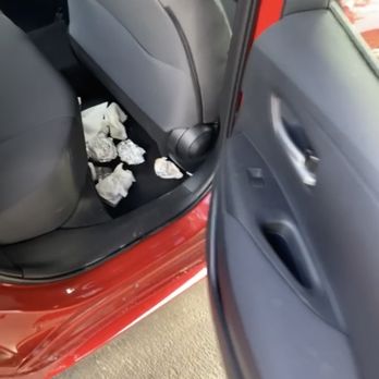 Avis Car Rental - Trash behind passenger seat. - Car Rental Near Me - Ontario, California Avis Car Rental - Trash behind passenger seat. - Car Rental Near Me - Ontario, California