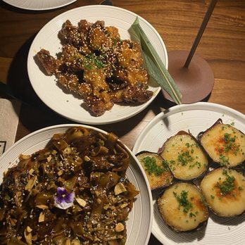 Fortu - Orange chicken, Japanese sweet potatoes, stir fry noodles with wagyu - Wine Bars Near Me - St. Petersburg, Florida Fortu - Orange chicken, Japanese sweet potatoes, stir fry noodles with wagyu - Wine Bars Near Me - St. Petersburg, Florida