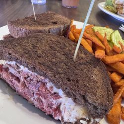 Reuben sandwich with sweet potato fries