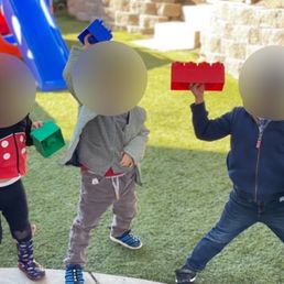 Kids playing in the backyard. Faces blurred out for privacy. Kids playing in the backyard. Faces blurred out for privacy.
