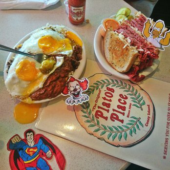 Plato's Place - HashBrown smothered with Chili,  Cheese,  Loose Burger n Onions topped with Eggs outstanding Delicious Love - Greek Near Me - Garden City, Michigan