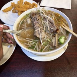 Beef short rib and filet pho and calamari. Beef short rib and filet pho and calamari.