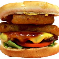 NEW Cowboy Burger: 1/4 Lb. Lean Ground Beef Patty, Steak Burger Sauce, American Cheese, Pickle, Onion Rings, Tomato and Lettuce