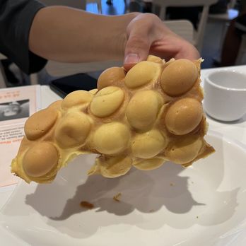 Sam Woo Cafe - Perfectly shaped crispy around the edges and soft inside bubble egg waffle best when eaten right away. - Desserts Near Me - Artesia, California