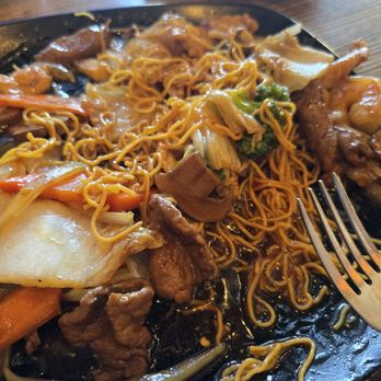 Pho Viet - Fried egg noodle combo with beef shrimp and chicken and vegetables. Half eaten - Vietnamese Near Me - Redlands, California Pho Viet - Fried egg noodle combo with beef shrimp and chicken and vegetables. Half eaten - Vietnamese Near Me - Redlands, California