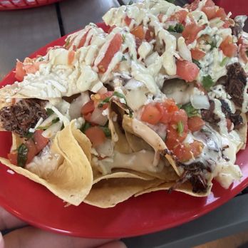 Fuzzy's Taco Shop - Shredded Brisket Nachos - Breakfast & Brunch Near Me - Oklahoma City, Oklahoma Fuzzy's Taco Shop - Shredded Brisket Nachos - Breakfast & Brunch Near Me - Oklahoma City, Oklahoma