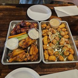 Hot honey and blackberry habenero wings with cheese curds. Hot honey and blackberry habenero wings with cheese curds.