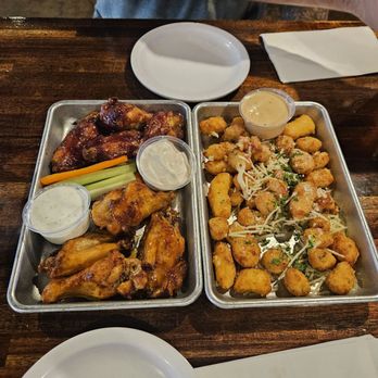Martin's Downtown - Hot honey and blackberry habenero wings with cheese curds. - Sports Bars Near Me - Roanoke, Virginia Martin's Downtown - Hot honey and blackberry habenero wings with cheese curds. - Sports Bars Near Me - Roanoke, Virginia