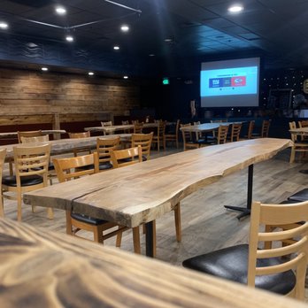 Chaos Bay Brewing Co - tables and chairs in a restaurant - Breweries Near Me - Bremerton, Washington Chaos Bay Brewing Co - tables and chairs in a restaurant - Breweries Near Me - Bremerton, Washington