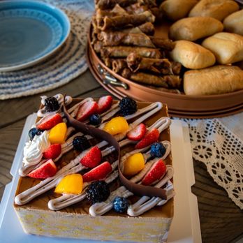 Bakery 1908 - Chocolate mousse cake mixed with our homemade Filipino lumpia and dinner rolls. - Bakeries Near Me - Tampa, Florida