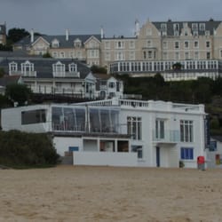 Porthminster Hotel - The St Ives Harbour Hotel, The Porthminster, St. Ives seen from Porthminster Beach (early morning so a bit dark) and the