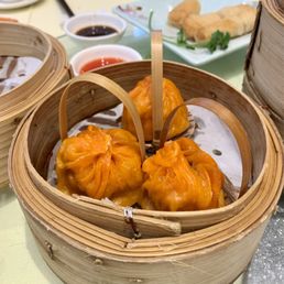 Steamed Special Hot and Sour Pork in Soup Dumpling / 特色酸湯灌湯包