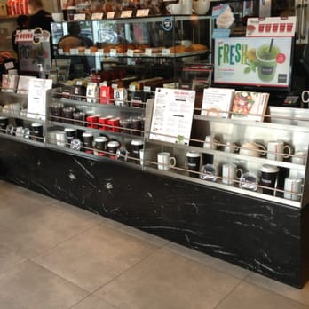 Aroma Espresso Bar - a man standing in front of it - Coffee & Tea Near Me - Toronto, Ontario Aroma Espresso Bar - a man standing in front of it - Coffee & Tea Near Me - Toronto, Ontario