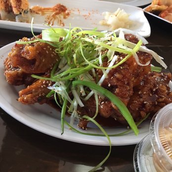 Umami - The KFC (Korean fried chicken) wings. 1/2 spicy and 1/2 regular - Sushi Bars Near Me - Nashville, Tennessee Umami - The KFC (Korean fried chicken) wings. 1/2 spicy and 1/2 regular - Sushi Bars Near Me - Nashville, Tennessee