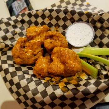 The Wayside Cafe - Cauliflower wings tossed in buffalo sauce and a side of ranch - Vegan Near Me - Olympia, Washington