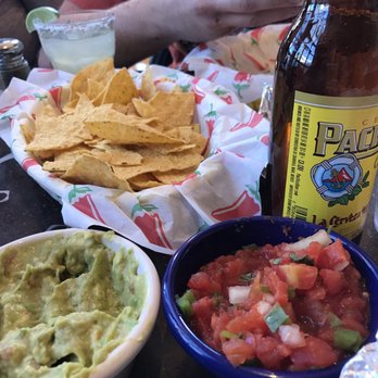 Teocalli Tamale - Salsa, Guac, Chips and of course, Pacifico (Margarita in the background). - Mexican Near Me - Crested Butte, Colorado Teocalli Tamale - Salsa, Guac, Chips and of course, Pacifico (Margarita in the background). - Mexican Near Me - Crested Butte, Colorado