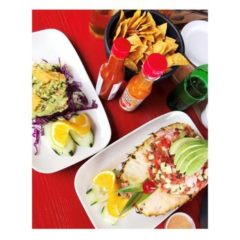 Villa Ortega's - Guac, chips, and ceviche served in a pineapple! - Seafood Near Me - Puerto Nuevo, BCN Villa Ortega's - Guac, chips, and ceviche served in a pineapple! - Seafood Near Me - Puerto Nuevo, BCN