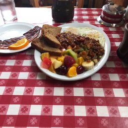 Two eggs, hash browns covered in chili, great bacon Two eggs, hash browns covered in chili, great bacon