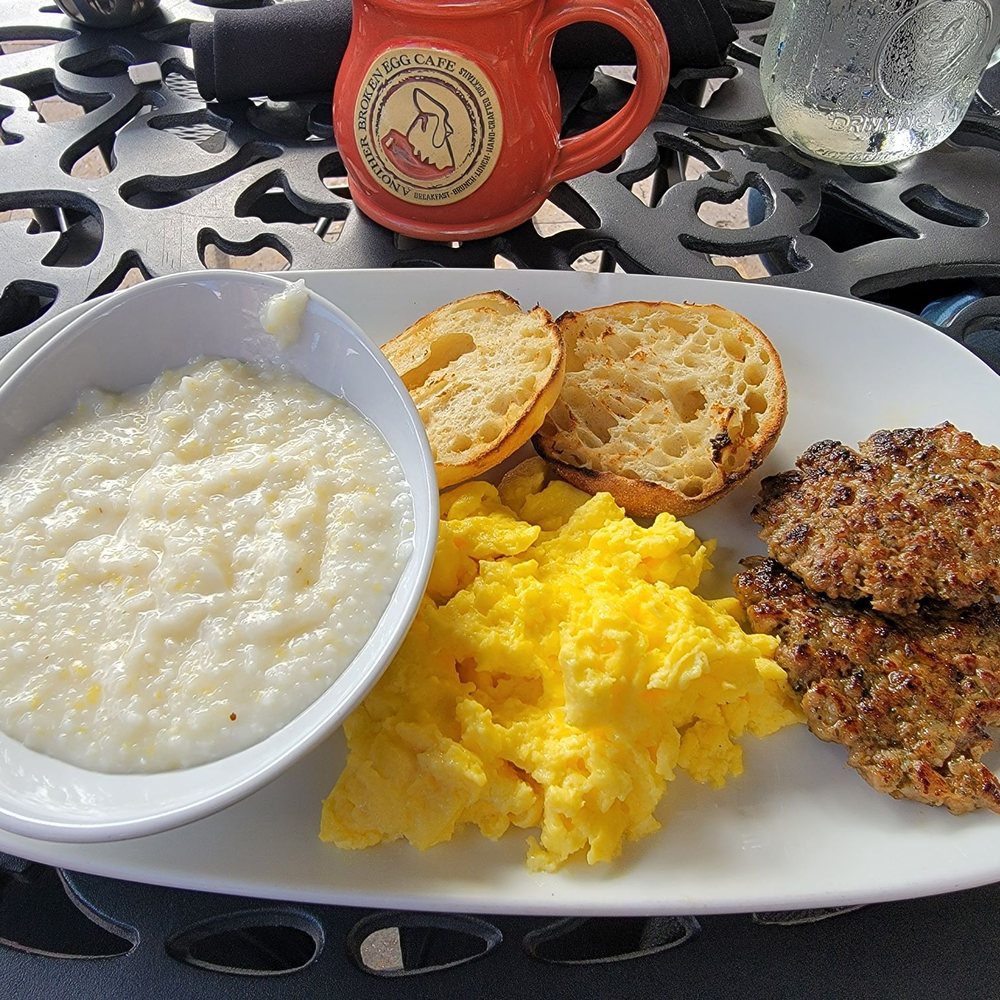 Another Broken Egg Cafe - Traditional Day Starter with scrambled eggs, house-made sausage patties, english muffin, and grits - Breakfast & Brunch Near Me - Shenandoah, Texas Another Broken Egg Cafe - Traditional Day Starter with scrambled eggs, house-made sausage patties, english muffin, and grits - Breakfast & Brunch Near Me - Shenandoah, Texas
