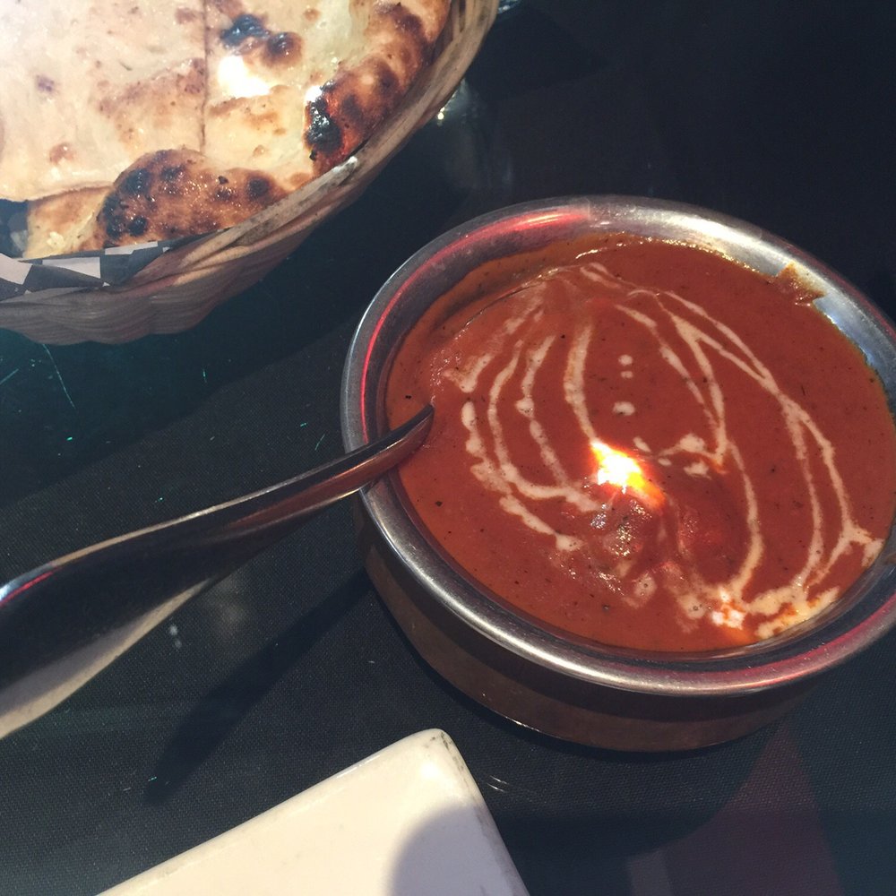 Jaipur India Cuisine - a bowl of soup and a plate of naan bread - Indian Near Me - Cochrane, Alberta Jaipur India Cuisine - a bowl of soup and a plate of naan bread - Indian Near Me - Cochrane, Alberta