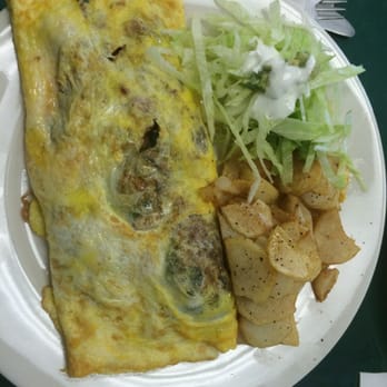 El Rey de Oros - Omelet overstuffed with caramelized veggies and just-wilted baby spinach. - Salvadoran Near Me - Hatboro, Pennsylvania El Rey de Oros - Omelet overstuffed with caramelized veggies and just-wilted baby spinach. - Salvadoran Near Me - Hatboro, Pennsylvania